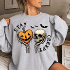 Women’s Halloween Skull & Pumpkin Heart Graphic Sweatshirt, Skeleton Hand and Bat Print Crewneck Pullover, Cozy Long Sleeve Fall Top, Vintage Spooky Season Shirt for Halloween Parties, Pumpkin Patch Trips, Weekend Wear & Autumn Gifts